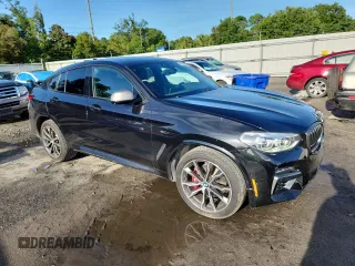 2021 BMW X4 M40i with VIN 5UX2V5C05M9F68427, listed as a Copart auction lot 64941095 with 50,208 mi miles and Salvage title. Bid and sale history available at DreamBid. Image 4.