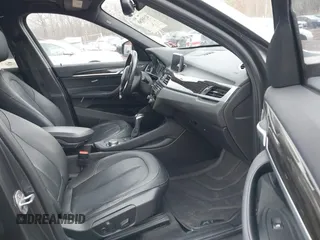 2017 BMW X1 xDrive28i with VIN WBXHT3C35H5F74213, listed as a IAAI auction lot 41589180 with 58,990 mi miles. Bid and sale history available at carsss.com. Image 5.