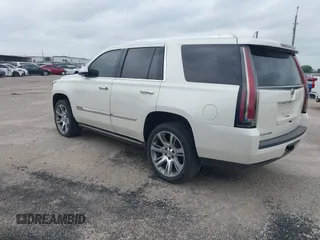 2015 Cadillac Escalade Premium z VIN 1GYS4CKJ4FR216873, wystawiony jako IAAI lot #41677234 z przebiegiem 128 990 mil mil oraz . Historia ofert i sprzedaży dostępna na DreamBid. Obrazek 3.