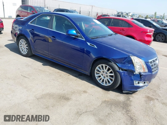 2012 Cadillac CTS Luxury with VIN 1G6DE5E59C0102621, listed as a IAAI auction lot 42554121 with 128,430 mi miles and . Bid and sale history available at DreamBid. Image 1.
