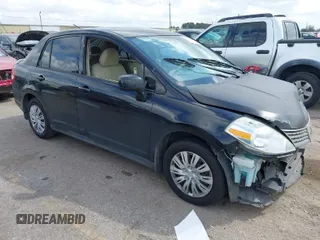 2009 Nissan Versa 1.8 S with VIN 3N1BC11E09L450167, listed as a IAAI auction lot 41711284 with 91,216 mi miles. Bid and sale history available at carsss.com. Image 1.