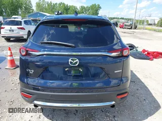 2021 Mazda CX-9 Grand Touring with VIN JM3TCBDY4M0513099, listed as a IAAI auction lot 42563530 with 76,006 mi miles and . Bid and sale history available at DreamBid. Image 17.