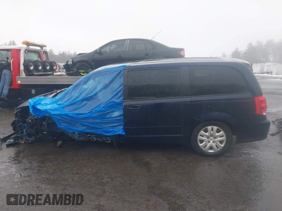 2016 Dodge Grand Caravan SE with VIN 2C4RDGBG3GR258639, listed as a IAAI auction lot 41687082 with 99,616 mi miles and . Bid and sale history available at DreamBid. Image 15.