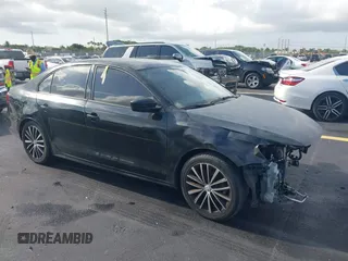 2016 Volkswagen Jetta Sport z VIN 3VWD17AJ6GM289355, wystawiony jako IAAI lot #42464456 z przebiegiem 99 328 mil mil oraz . Historia ofert i sprzedaży dostępna na DreamBid. Obrazek 1.