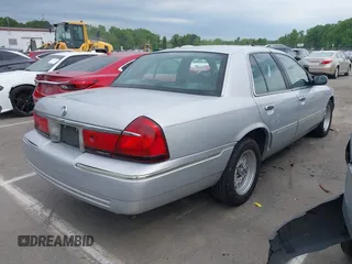 2001 Mercury Grand Marquis LS z VIN 2MEFM75W91X655747, wystawiony jako IAAI lot #42041090 z przebiegiem 138 906 mil mil oraz . Historia ofert i sprzedaży dostępna na DreamBid. Obrazek 4.