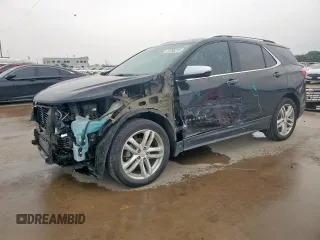2021 Chevrolet Equinox Premier z VIN 2GNAXNEV9M6136701, wystawiony jako Copart lot #57288215 z przebiegiem 62 808 mil mil oraz Szkoda całkowita • Salvage title. Historia ofert i sprzedaży dostępna na DreamBid. Obrazek 1.