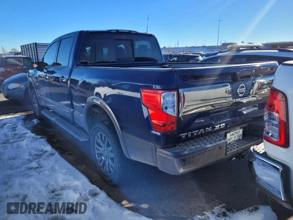 2016 Nissan Titan Platinum Reserve z VIN 1N6BA1F47GN502505, wystawiony jako IAAI lot #42520972 z przebiegiem 104 949 mil mil oraz . Historia ofert i sprzedaży dostępna na DreamBid. Obrazek 21.