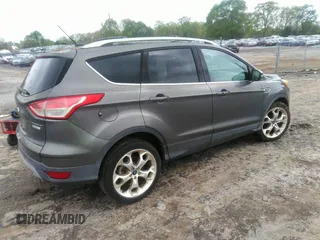 2013 Ford Escape Titanium with VIN 1FMCU0J92DUC70534, listed as a IAAI auction lot 41967096 with 77,921 mi miles and . Bid and sale history available at carsss.com. Image 4.