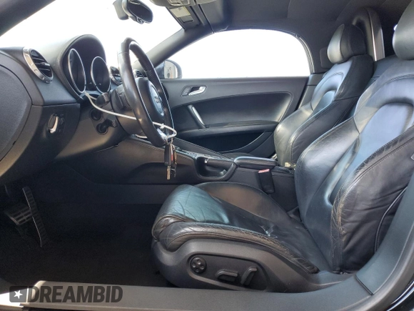 2008 Audi TT 2.0T with VIN TRUMF38J481034405, listed as a Copart auction lot 61779265 with 104,271 mi miles and Salvage title. Bid and sale history available at DreamBid. Image 7.