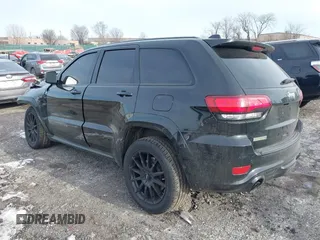2017 Jeep Grand Cherokee SRT with VIN 1C4RJFDJ7HC641926, listed as a IAAI auction lot 41272215 with 117,667 mi miles. Bid and sale history available at carsss.com. Image 3.