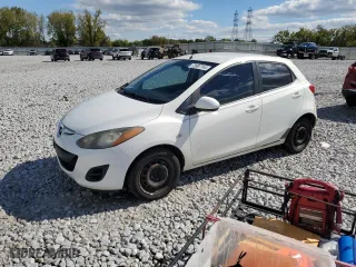 2014 Mazda Mazda2 Sport with VIN JM1DE1KY5E0172866, listed as a Copart auction lot 73997744 with 181,163 mi miles and Salvage Title. Bid and sale history available at carsss.com. Image 1.
