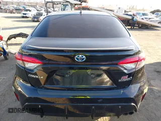 2023 Toyota Corolla Hybrid LE with VIN JTDBCMFE4P3015622, listed as a IAAI auction lot 41644340 with 66,099 mi miles. Bid and sale history available at carsss.com. Image 17.