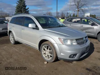 2012 Dodge Journey SXT with VIN 3C4PDCCG0CT278367, listed as a IAAI auction lot 41275912 with 154,117 mi miles and . Bid and sale history available at DreamBid. Image 1.