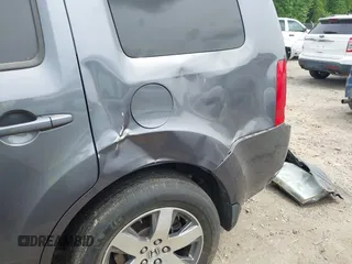 2015 Honda Pilot Touring z VIN 5FNYF4H97FB037326, wystawiony jako IAAI lot #42056668 z przebiegiem 215 381 mil mil oraz . Historia ofert i sprzedaży dostępna na DreamBid. Obrazek 20.
