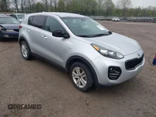 2017 Kia Sportage LX z VIN KNDPMCAC1H7140218, wystawiony jako IAAI lot #42024024 z przebiegiem 129 799 mil mil oraz . Historia ofert i sprzedaży dostępna na DreamBid. Obrazek 1.