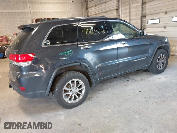 2015 Jeep Grand Cherokee Limited with VIN 1C4RJFBG5FC941811, listed as a IAAI auction lot 41003336 with 137,867 mi miles. Bid and sale history available at carsss.com. Image 4.
