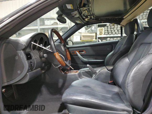 2003 Mercedes-Benz SLK 320 with VIN WDBKK65F23F277574, listed as a Copart auction lot 82523004 with 112,143 mi miles and Clean title. Bid and sale history available at DreamBid. Image 7.