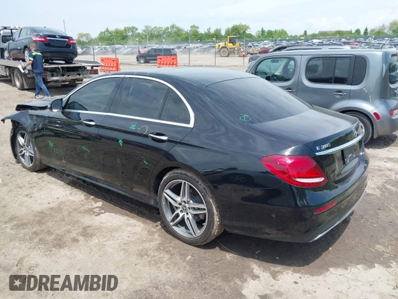 2018 Mercedes-Benz E with VIN WDDZF4KB2JA381699, listed as a IAAI auction lot 39407980 with 52,865 mi miles. Bid and sale history available at carsss.com. Image 3.