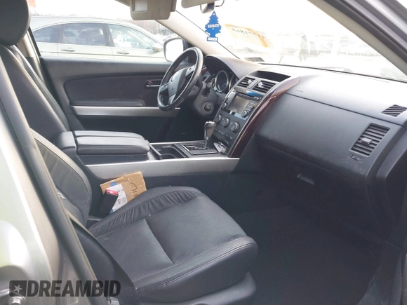 2015 Mazda CX-9 Grand Touring with VIN JM3TB3DA6F0447184, listed as a IAAI auction lot 41771865 with 137,814 mi miles. Bid and sale history available at carsss.com. Image 5.
