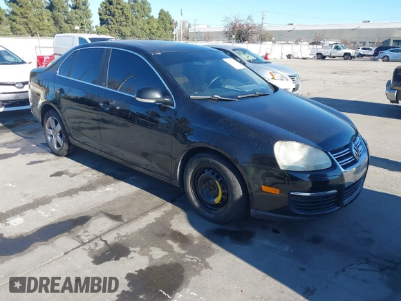 2008 Volkswagen Jetta SE z VIN 3VWRZ71K18M166457, wystawiony jako IAAI lot #41392289 z przebiegiem 244 330 mil mil oraz . Historia ofert i sprzedaży dostępna na DreamBid. Obrazek 1.