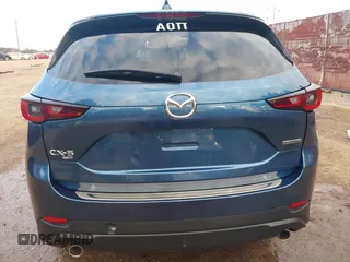 2023 Mazda CX-5 2.5 S Carbon Edition with VIN JM3KFBCM2P0235177, listed as a IAAI auction lot 41209889 with 15,588 mi miles. Bid and sale history available at carsss.com. Image 16.