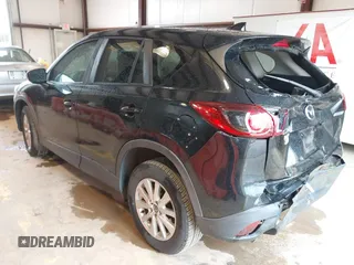 2016 Mazda CX-5 Touring with VIN JM3KE2CY7G0867355, listed as a IAAI auction lot 41963169 with 117,727 mi miles and . Bid and sale history available at DreamBid. Image 3.