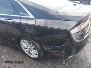 2014 Lincoln MKZ with VIN 3LN6L2G91ER814890, listed as a IAAI auction lot 41651789 with 143,445 mi miles and . Bid and sale history available at DreamBid. Image 19.