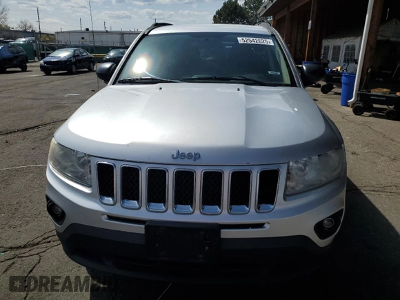 2011 Jeep Compass Latitude with VIN 1J4NF1FB6BD263831, listed as a Copart auction lot 52542625 with 160,743 mi miles and Salvage Title. Bid and sale history available at DreamBid. Image 5.