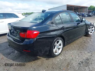 2013 BMW 3 Series 320i xDrive with VIN WBA3C3C52DF979114, listed as a IAAI auction lot 42439598 with 111,458 mi miles and . Bid and sale history available at DreamBid. Image 4.