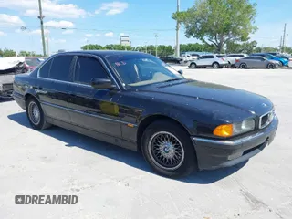 1997 BMW 7 Series with VIN WBAGF8325VDL45398, listed as a IAAI auction lot 41910072 with 174,590 mi miles and . Bid and sale history available at DreamBid. Image 1.