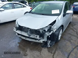 2022 Toyota Prius L Eco with VIN JTDKAMFU2N3161592, listed as a IAAI auction lot 42245464 with 146,891 mi miles and . Bid and sale history available at DreamBid. Image 6.