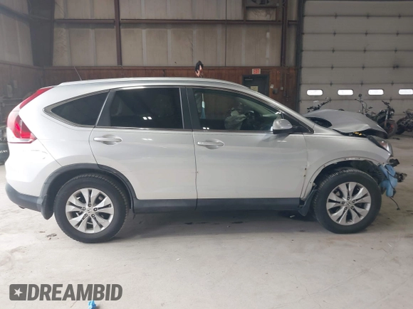 2013 Honda CR-V EX-L with VIN 2HKRM3H70DH509027, listed as a IAAI auction lot 41900728 with 90,819 mi miles and . Bid and sale history available at DreamBid. Image 14.