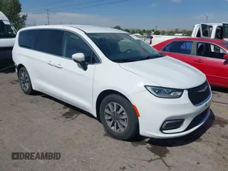 2023 Chrysler Pacifica Hybrid Touring L with VIN 2C4RC1L73PR611735, listed as a IAAI auction lot 42721569 with 54,462 mi miles and . Bid and sale history available at DreamBid. Image 1.