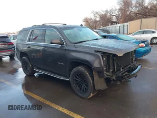 2015 GMC Yukon SLT with VIN 1GKS2BKC7FR110106, listed as a IAAI auction lot 41702260 with 108,679 mi miles. Bid and sale history available at carsss.com. Image 1.