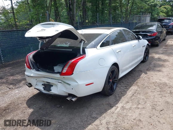 2014 Jaguar XJ with VIN SAJWA2EK8EMV67443, listed as a IAAI auction lot 42483075 with 88,357 mi miles and . Bid and sale history available at DreamBid. Image 4.