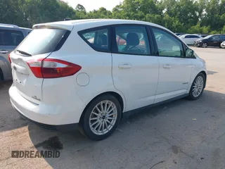 2014 Ford C-Max SE z VIN 1FADP5AU3EL511743, wystawiony jako IAAI lot #42404031 z przebiegiem 125 492 mil mil oraz . Historia ofert i sprzedaży dostępna na DreamBid. Obrazek 4.