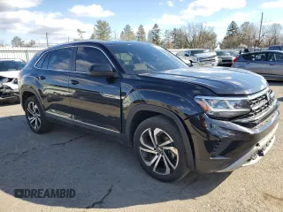 2023 Volkswagen Atlas SEL with VIN 1V2BE2CA8PC219239, listed as a Copart auction lot 45022555 with 22,770 mi miles and Salvage title. Bid and sale history available at DreamBid. Image 4.