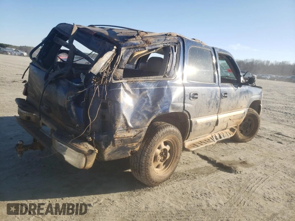 2002 GMC Yukon SLT with VIN 1GKEK13Z62J148557, listed as a Copart auction lot 43246075 with 242,968 mi miles and Salvage Title. Bid and sale history available at carsss.com. Image 3.