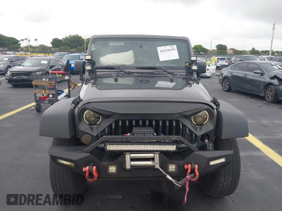 2018 Jeep Wrangler Unlimited Sport S with VIN 1C4BJWDG1JL810754, listed as a IAAI auction lot 42419199 with 74,901 mi miles and . Bid and sale history available at DreamBid. Image 12.