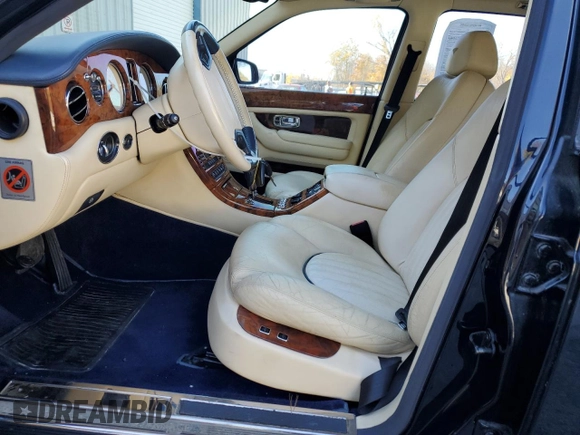 2001 Bentley Arnage with VIN SCBLC31E21CX05644, listed as a Copart auction lot 77706154 with 57,446 mi miles and Clean Title. Bid and sale history available at DreamBid. Image 7.