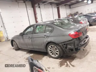 2018 BMW 3 Series 320i xDrive with VIN WBA8E5G50JNU48047, listed as a IAAI auction lot 41564022 with 69,971 mi miles. Bid and sale history available at carsss.com. Image 14.