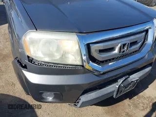 2009 Honda Pilot EX with VIN 5FNYF48439B036957, listed as a IAAI auction lot 41656284 with 199,115 mi miles. Bid and sale history available at carsss.com. Image 18.