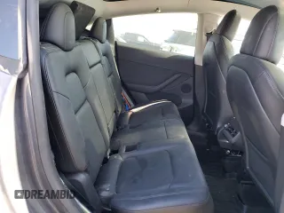 2022 Tesla Model Y Long Range z VIN 7SAYGDEE6NF429701, wystawiony jako Copart lot #58585665 z przebiegiem 86 537 mil mil oraz Szkoda całkowita • Salvage title. Historia ofert i sprzedaży dostępna na DreamBid. Obrazek 10.