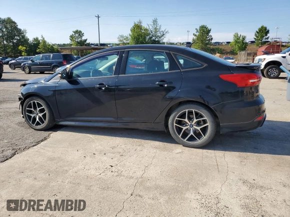 2016 Ford Focus SE z VIN 1FADP3F2XGL261707, wystawiony jako Copart lot #59078565 z przebiegiem 79 820 mil mil oraz Szkoda całkowita • Salvage title. Historia ofert i sprzedaży dostępna na DreamBid. Obrazek 2.