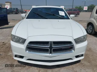 2013 Dodge Charger SXT with VIN 2C3CDXHG0DH664865, listed as a IAAI auction lot 41914053 with 195,211 mi miles. Bid and sale history available at carsss.com. Image 12.