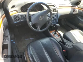 2002 Toyota Solara SE z VIN 2T1CF28P62C575561, wystawiony jako Copart lot #59748025 z przebiegiem 108 748 mil mil oraz Szkoda całkowita • Salvage title. Historia ofert i sprzedaży dostępna na DreamBid. Obrazek 8.