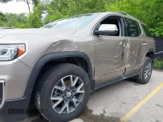 2023 GMC Acadia SLT with VIN 1GKKNUL41PZ184357, listed as a IAAI auction lot 42439400 with 60,238 mi miles and . Bid and sale history available at DreamBid. Image 6.
