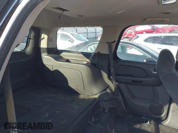 2009 Chevrolet Tahoe Police z VIN 1GNEC03009R163269, wystawiony jako IAAI lot #41500347 z przebiegiem 174 609 mil mil oraz . Historia ofert i sprzedaży dostępna na DreamBid. Obrazek 8.