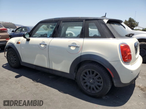 2017 MINI Hardtop 4 Door Cooper with VIN WMWXU1C32H2F77790, listed as a Copart auction lot 62352415 with 71,661 mi miles and Salvage title. Bid and sale history available at DreamBid. Image 2.