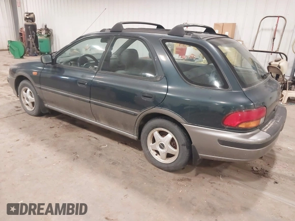 1996 Subaru Impreza Outback Special Sports with VIN JF1GF4858TH810489, listed as a IAAI auction lot 41361018 with 204,924 mi miles and . Bid and sale history available at DreamBid. Image 3.